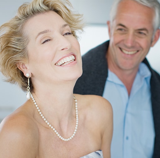 Elegant, smiling older couple