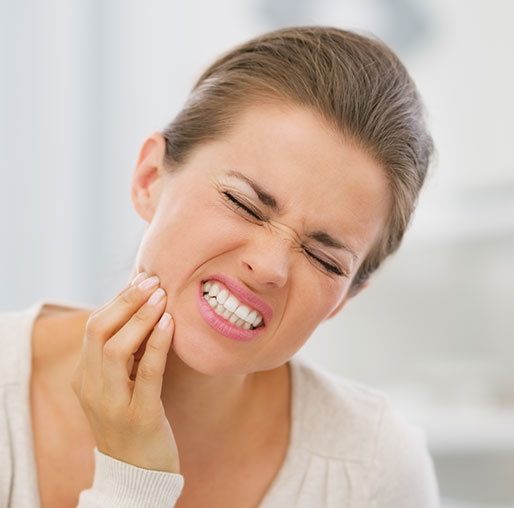 Woman with tooth pain